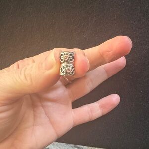 Pandora retired bracelet clips with silver, 14k gold and pink sapphire.